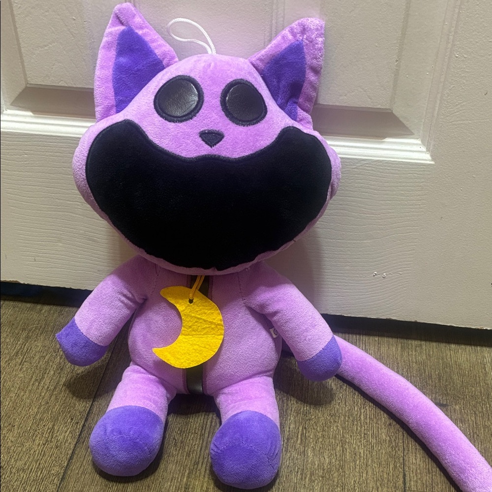 Purple Cat Plush Toy with Black Accents